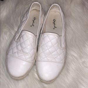 Quilted white Quipid brand slide-on shoes
